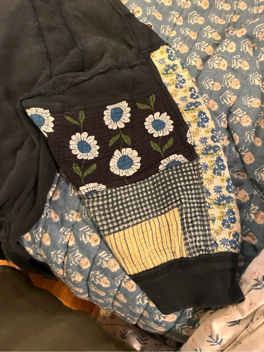 FREE PEOPLE We The Free Black Sweatshirt with Colorful Patchwork Sleeves sz M -